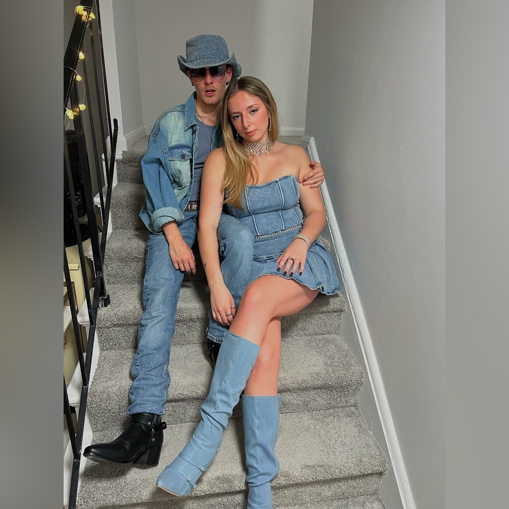 Full jean two piece set. Includes boots, top, skirt, necklace, and belly chain.